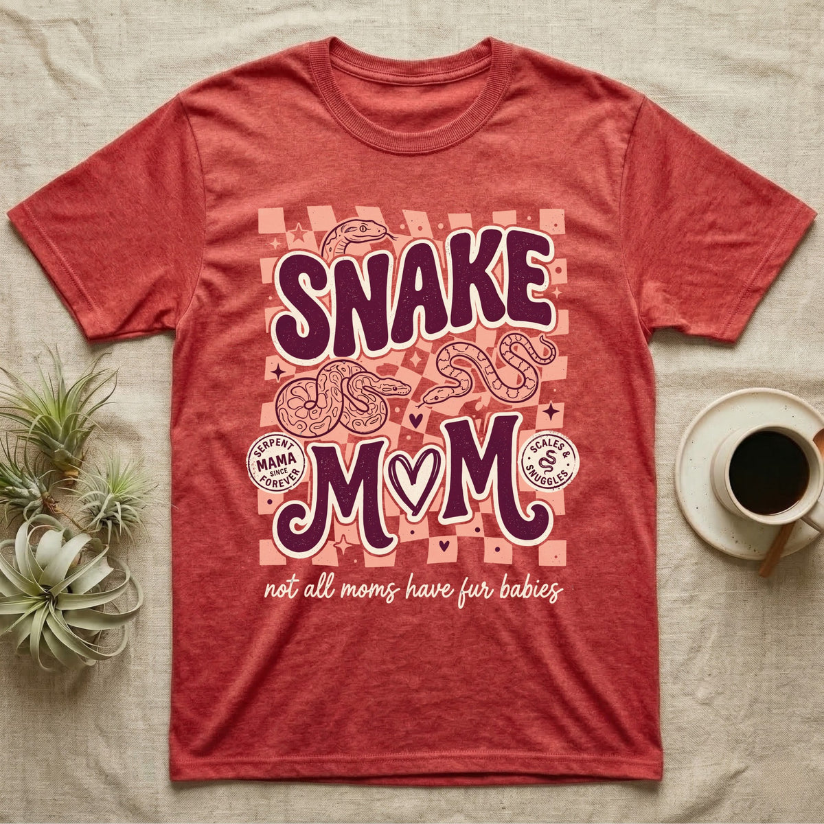 Red t-shirt with "Snake Mom" text and coiled snakes, "not all moms have fur babies."