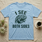 Panther Chameleon Mediator T-Shirt in Light Blue — Etching of a panther chameleon holding a twig, its eyes pointing opposite ways, under I SEE, above BOTH SIDES