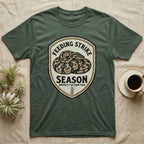 Ball Python Feeding Strike T-Shirt in Military Green — Vintage-ink badge of a coiled ball python with carved type "Feeding Strike Season" and fine print "Months 3-7 Of Every Year."