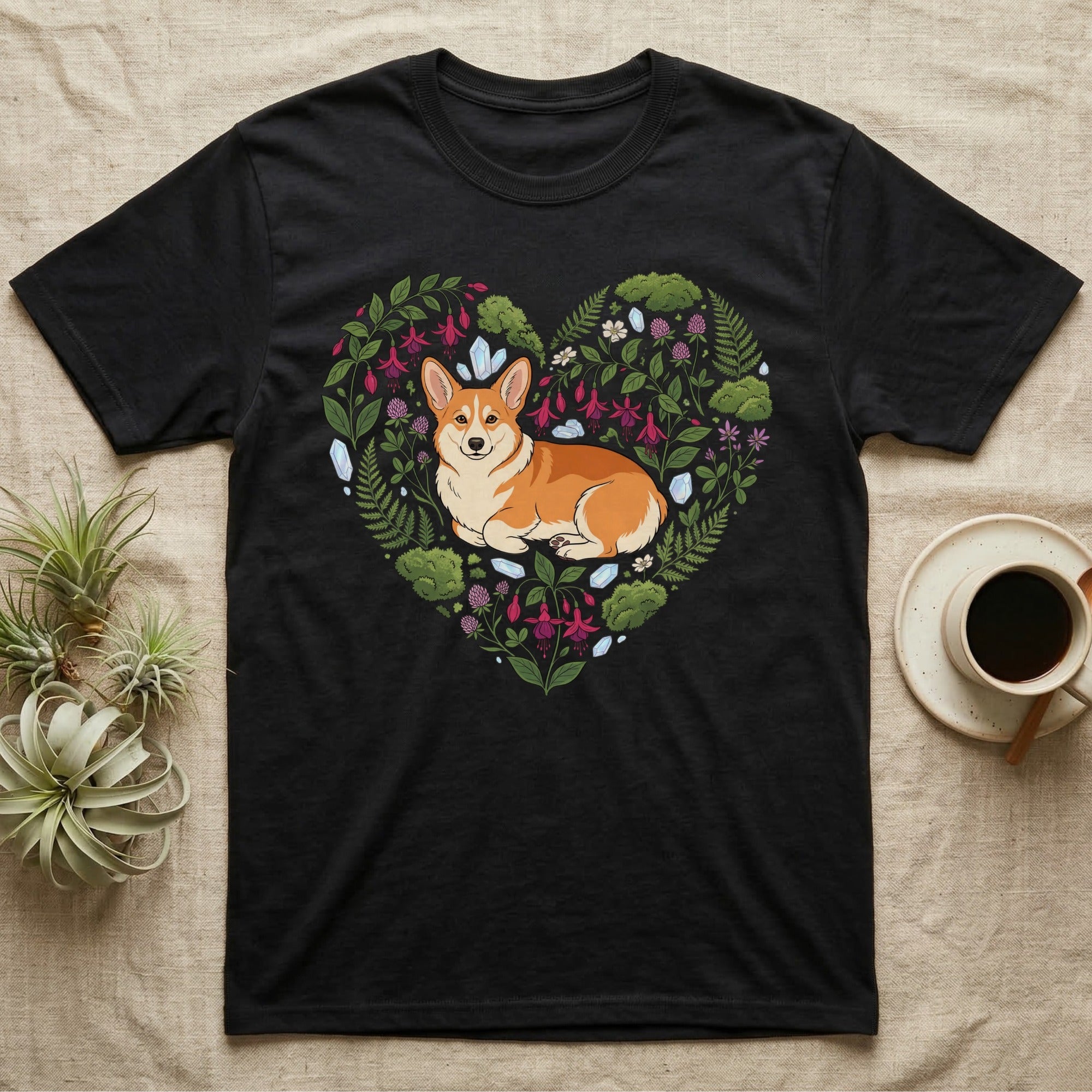 Black t-shirt with a heart-shaped floral design featuring a Pembroke Welsh Corgi.