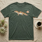 African Fat-Tailed Gecko Watercolour T-Shirt in Military Green — Watercolour African fat-tailed gecko in profile beneath a thin twig ending in a soft bloom, drawn with a broken ink line.