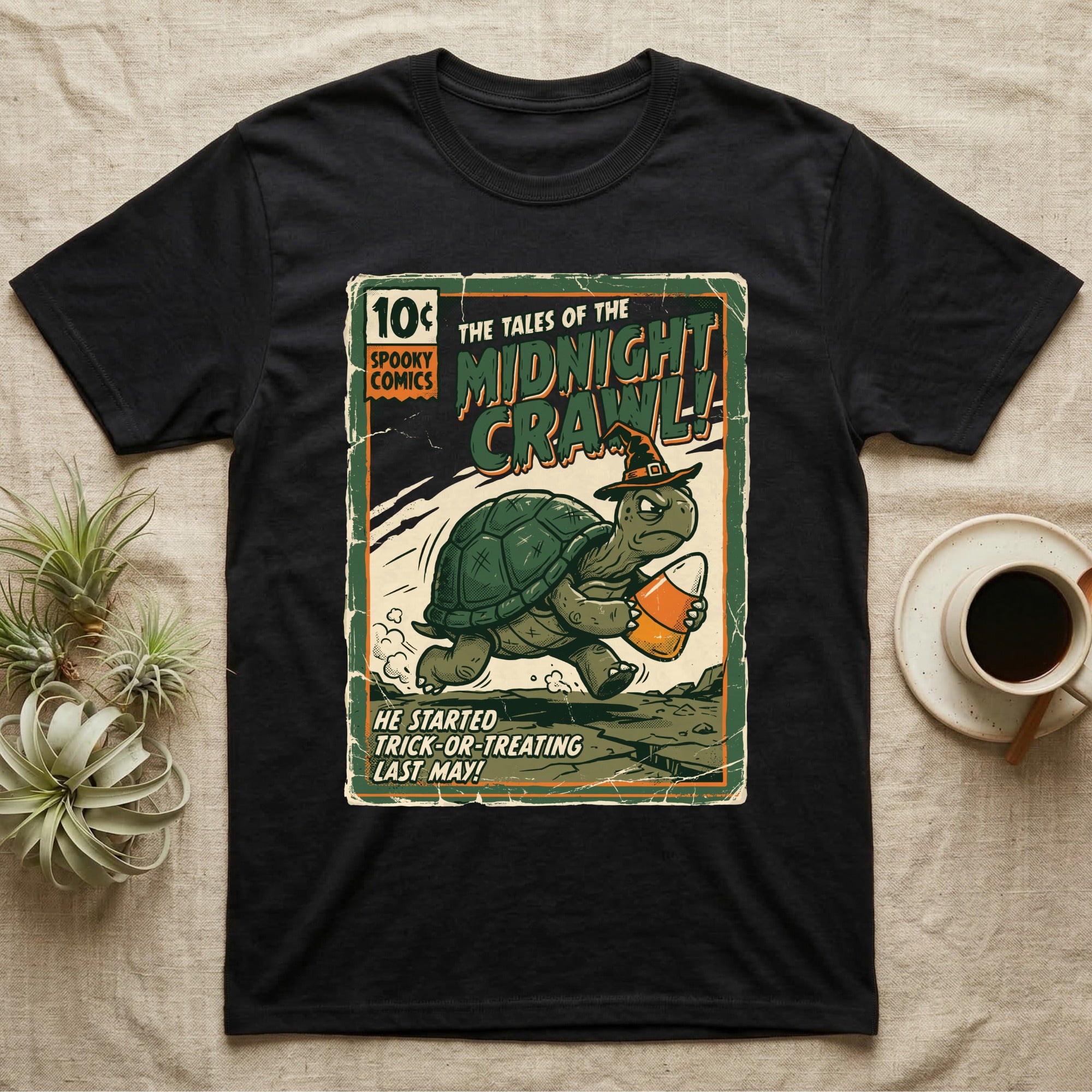 Tortoise Midnight Crawl Vintage T-Shirt in Black — Worn pulp comic cover of a witch-hatted tortoise dashing with a candy pail, "Tales of the Midnight Crawl."