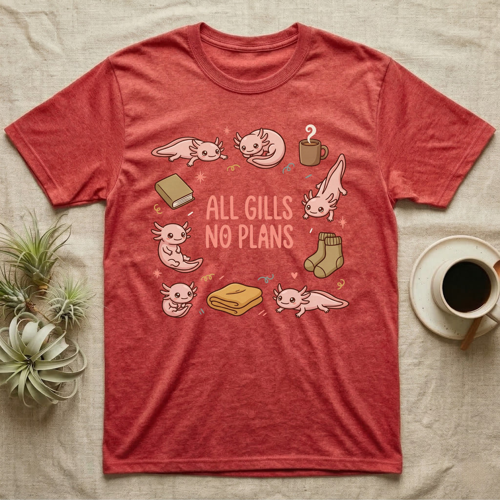 Axolotl All Gills No Plans T-Shirt in Heather Red — Cartoon sticker collection of six leucistic axolotls resting among a mug, socks, a blanket and a book, under the words ALL GILLS NO PLANS.