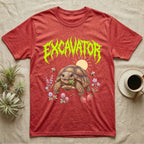 Russian Tortoise Feral T-Shirt in Heather Red — Chubby Russian tortoise munching a green in a pastel meadow under a spiky lime metal wordmark reading EXCAVATOR.