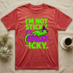 Crested Gecko Spellt-icky T-Shirt in Heather Red — Neon cartoon crested gecko in a witch hat with stacked text, "I'm Not Sticky, It's Spellt-icky."
