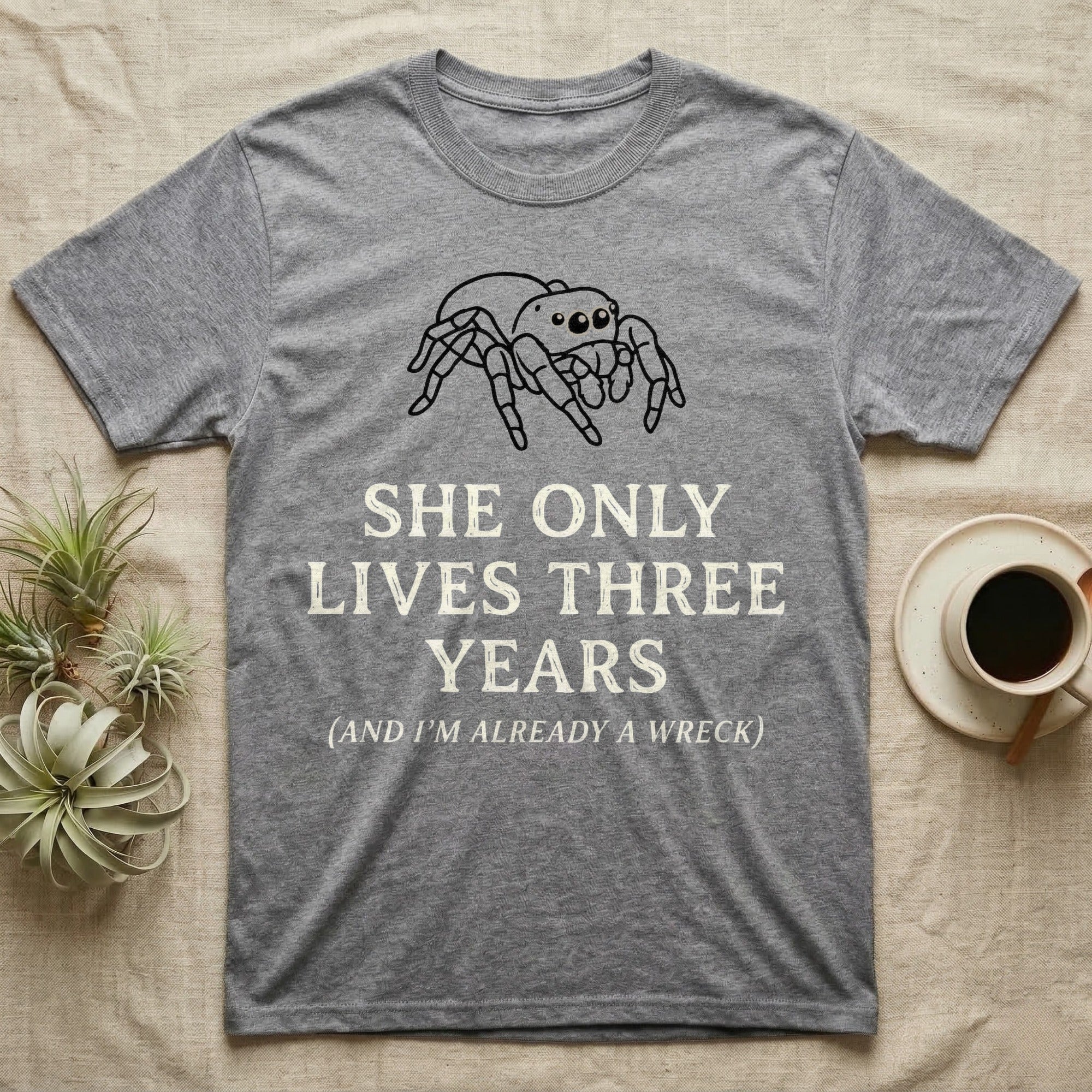 Jumping Spider Three Years Tee in Sport Grey — Vintage-ink Phidippus jumping spider portrait above type "She Only Lives Three Years (And I'm Already A Wreck)."