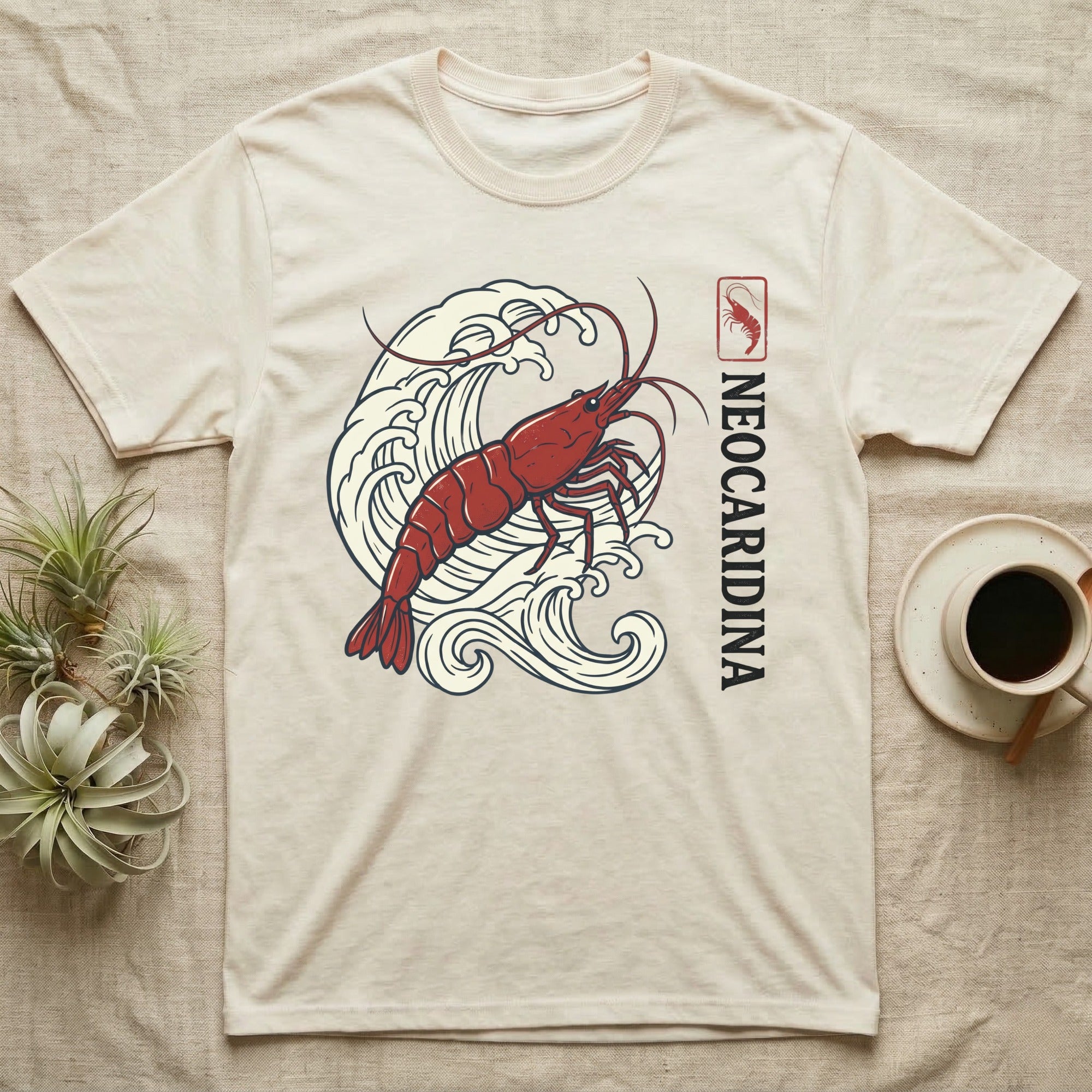 Cream t-shirt with red shrimp graphic and Japanese waves, text "Neocaridina".