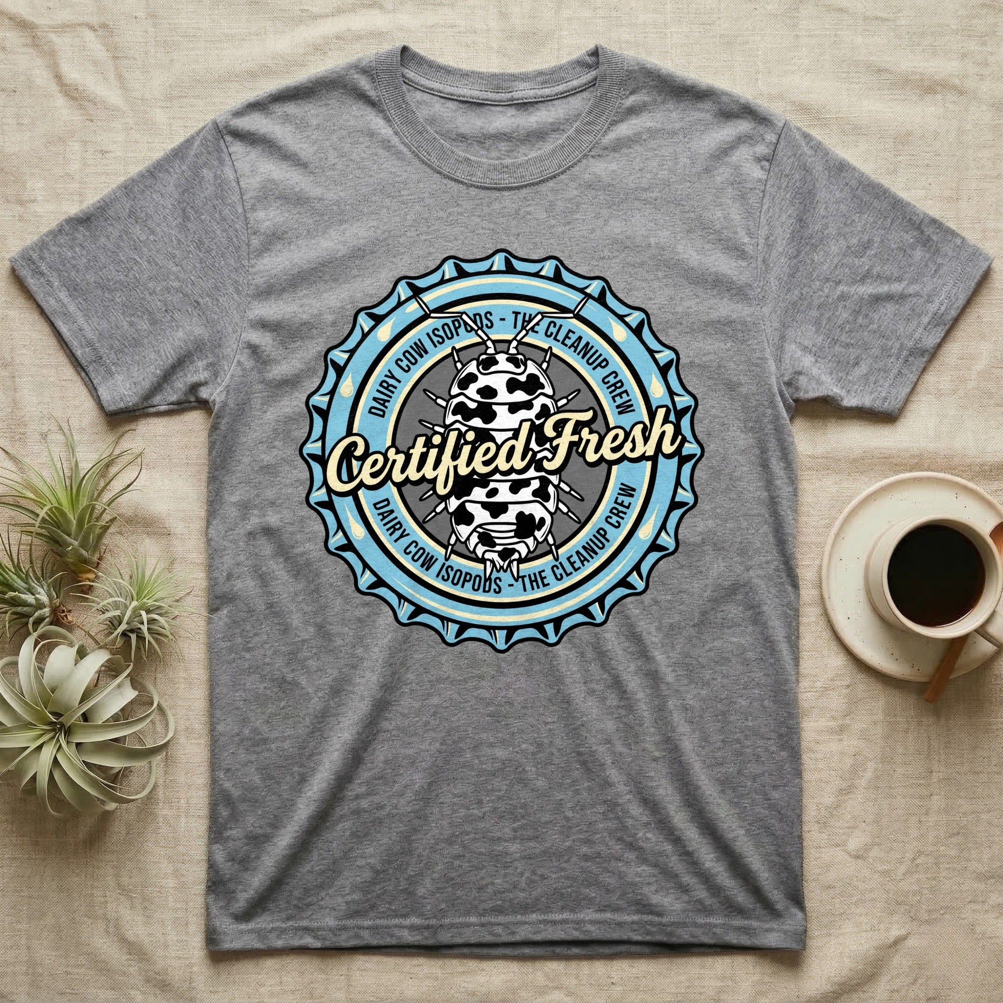 Grey t-shirt with circular "Certified Fresh Dairy Cow Isopods" logo.