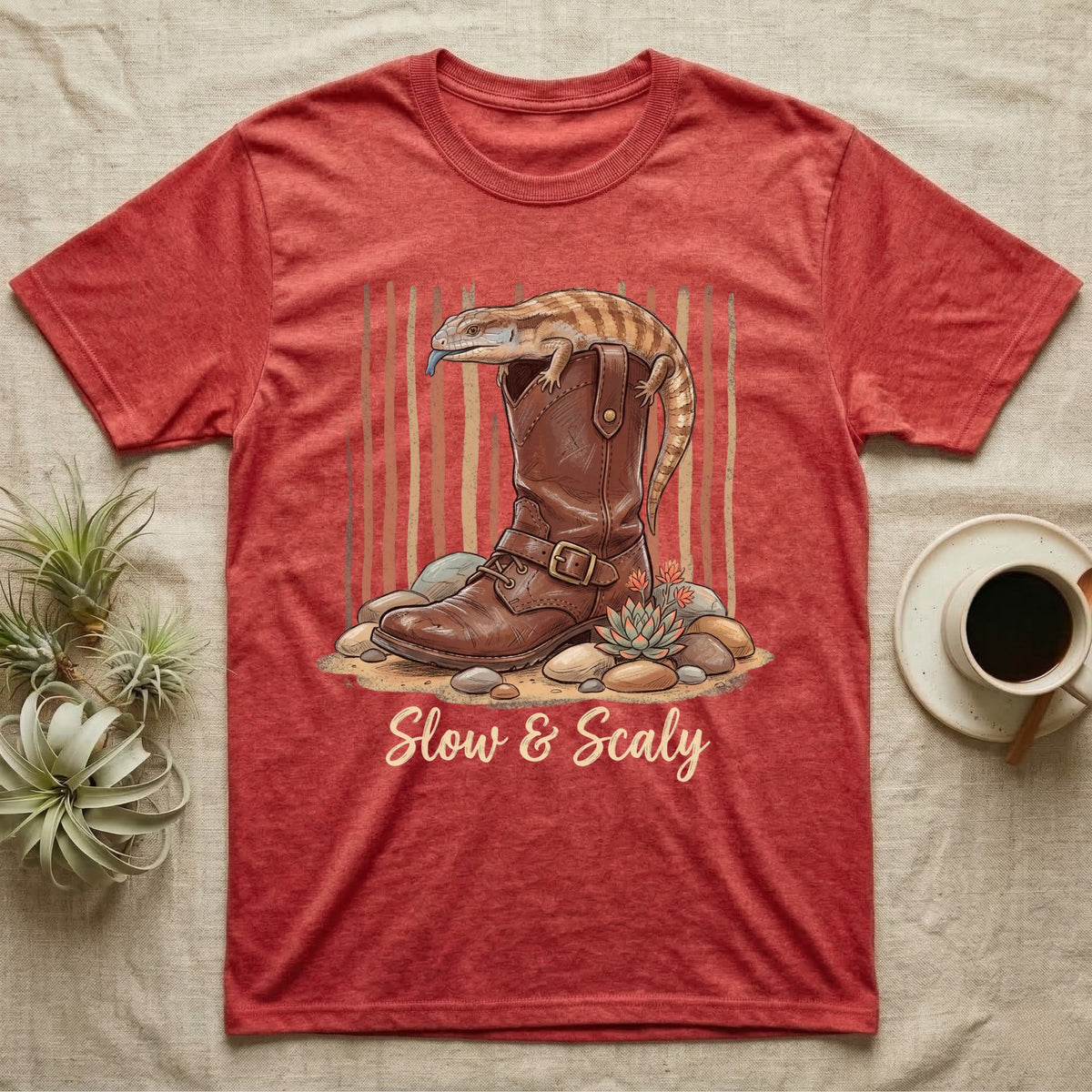 Brown cowboy boot with a lizard on top and text "Slow & Scaly".