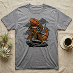 Grey t-shirt with a samurai lizard illustration against a cloudy background.