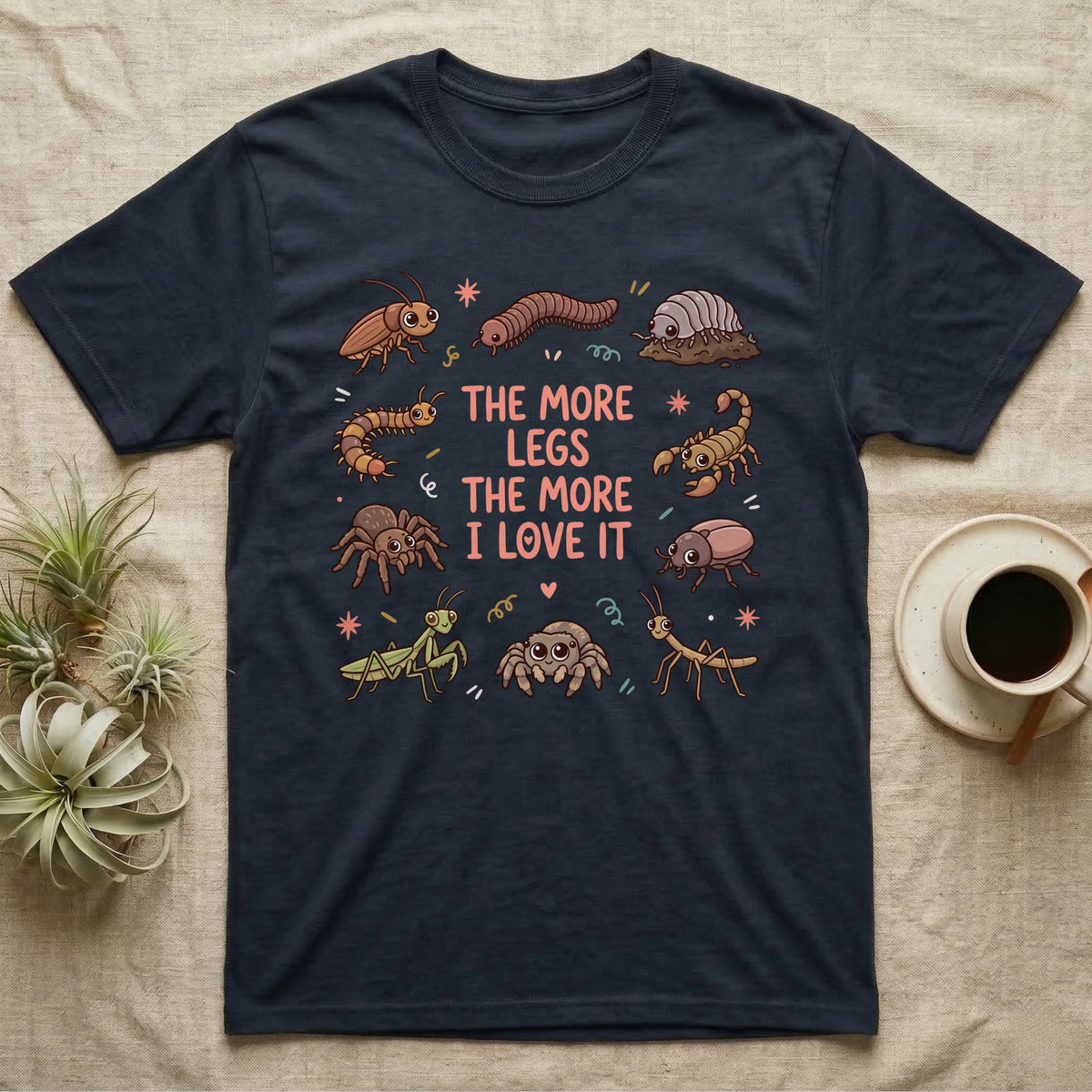 Invert More Legs T-Shirt in Navy — Ten cartoon roaches, isopods, scorpions and other inverts around coral-pink words THE MORE LEGS THE MORE I LOVE IT