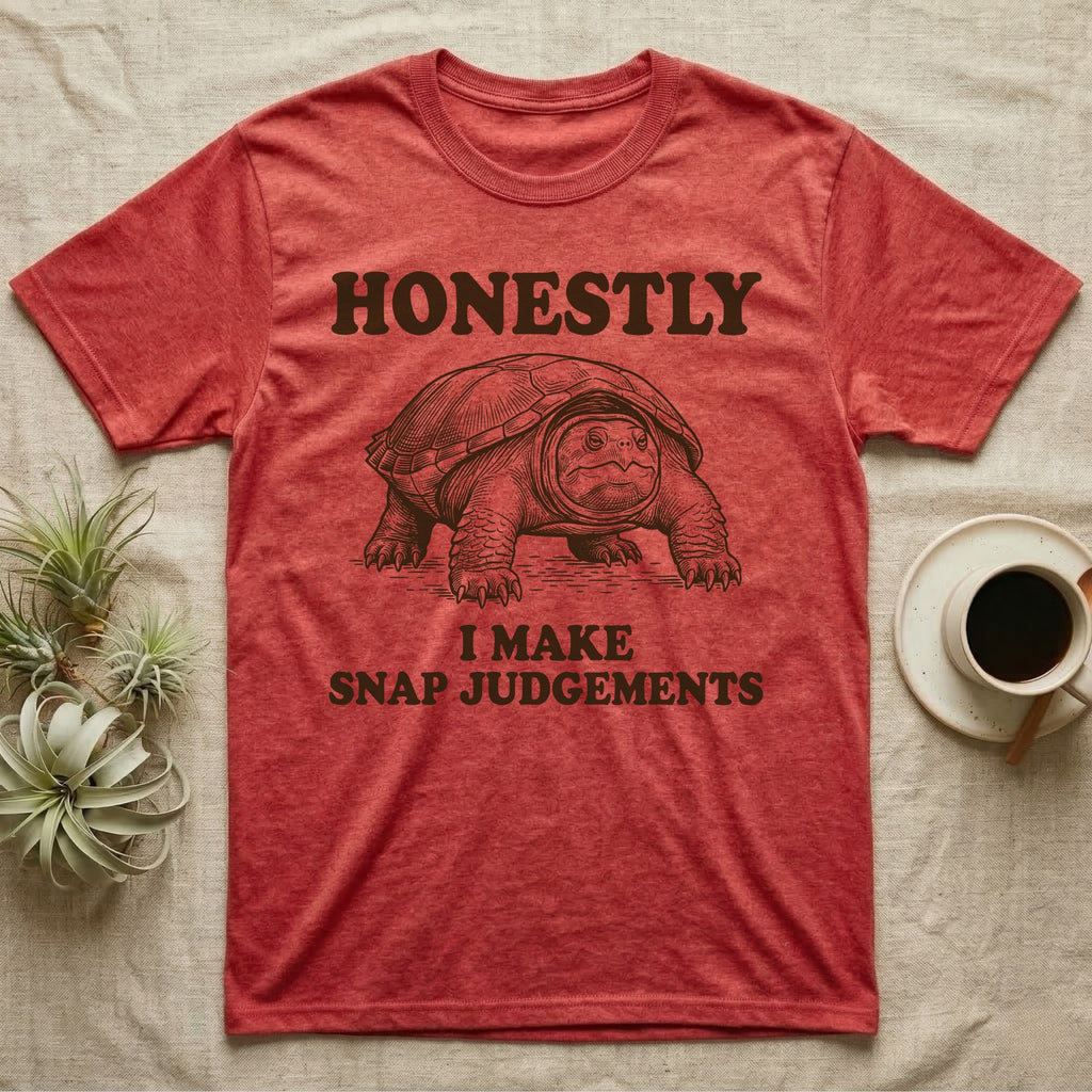 Snapping Turtle Judgements T-Shirt in Heather Red — Engraved snapping turtle standing, head forward, with the words Honestly, I Make Snap Judgements