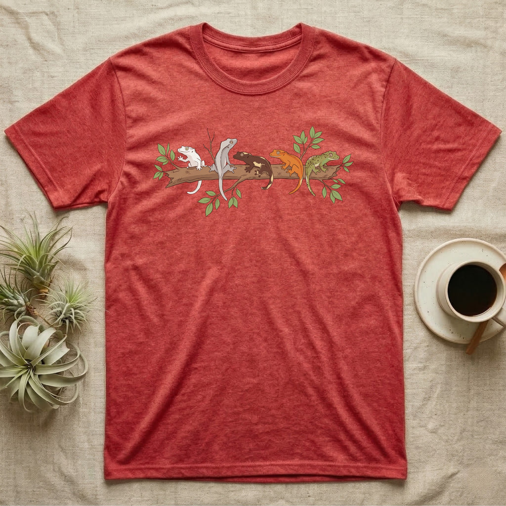 Crested Gecko Morph Line T-Shirt in Heather Red — Five crested gecko morphs in ink and watercolour perched along one cork bark branch with ficus leaves.