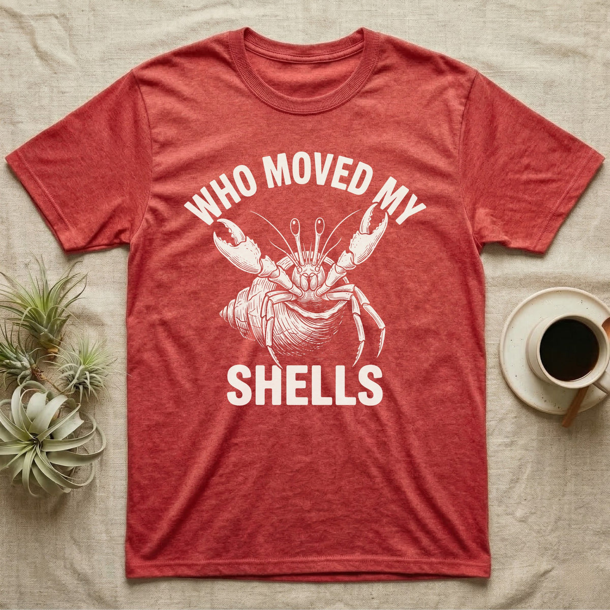 Hermit Crab Outrage T-Shirt in Heather Red — White-line engraving of a hermit crab flinging both claws up under the words Who Moved My Shells