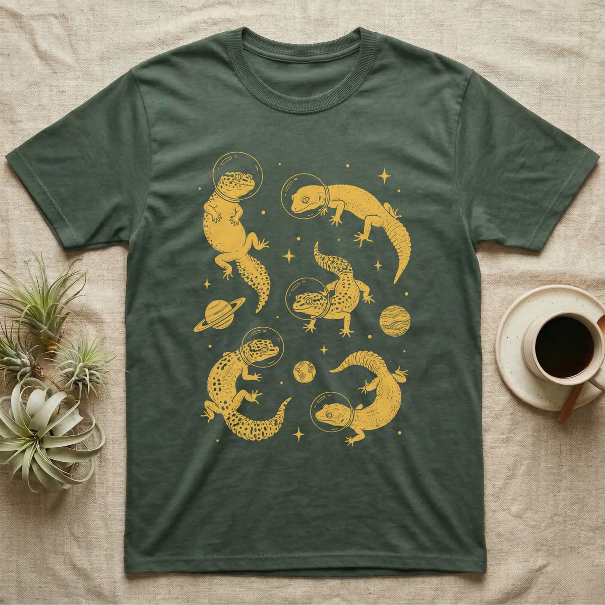 Leopard Gecko Cosmic T-Shirt in Military Green — Vintage screen-print illustration of leopard geckos in astronaut helmets floating in space, sulfur amber monochromatic on dark background.