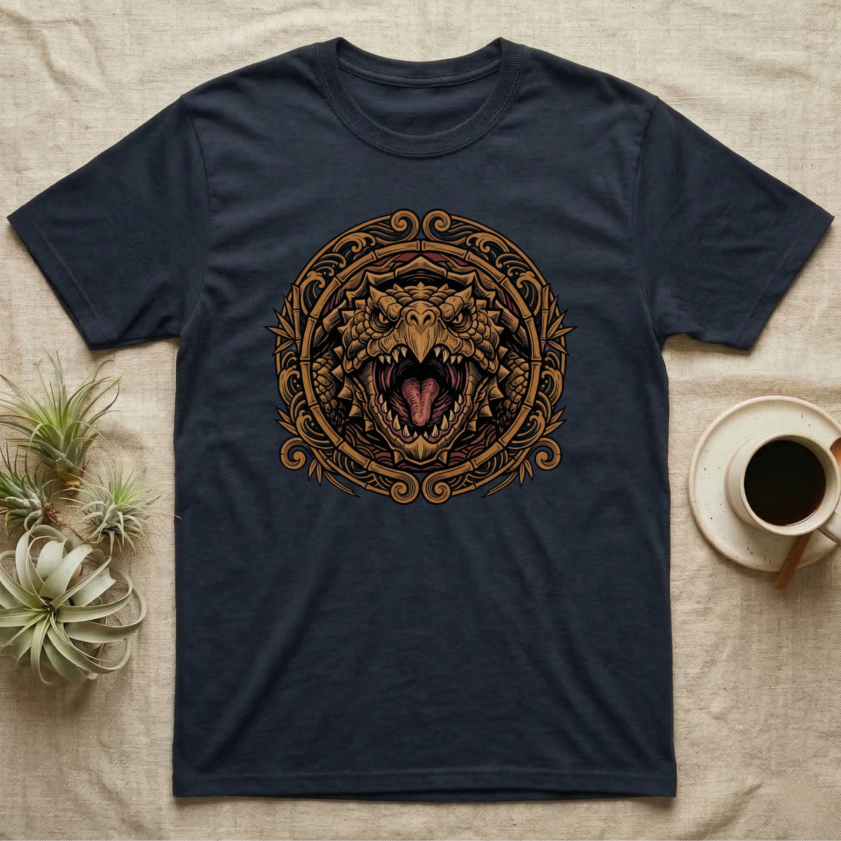Dark t-shirt with a circular, gold dragon head graphic.