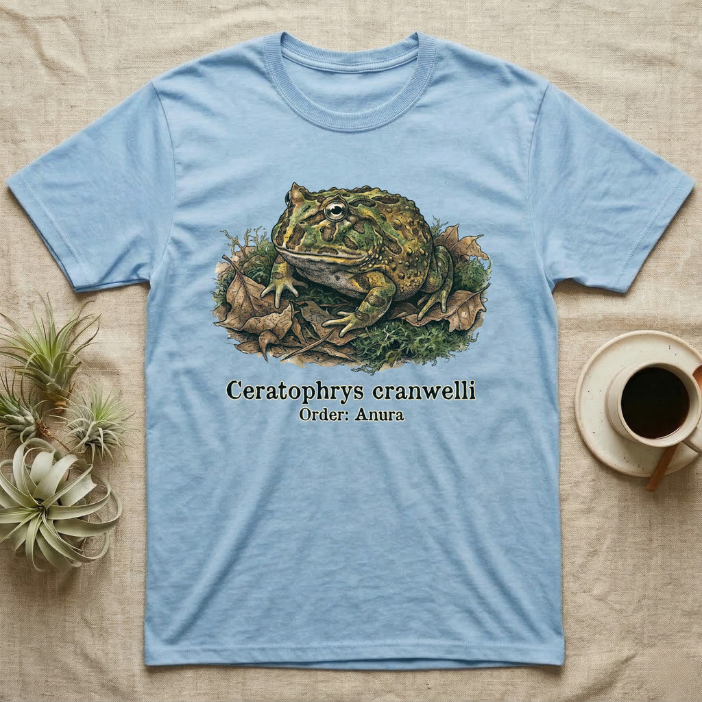 Light blue t-shirt with Ceratophrys cranwelli frog illustration and text.