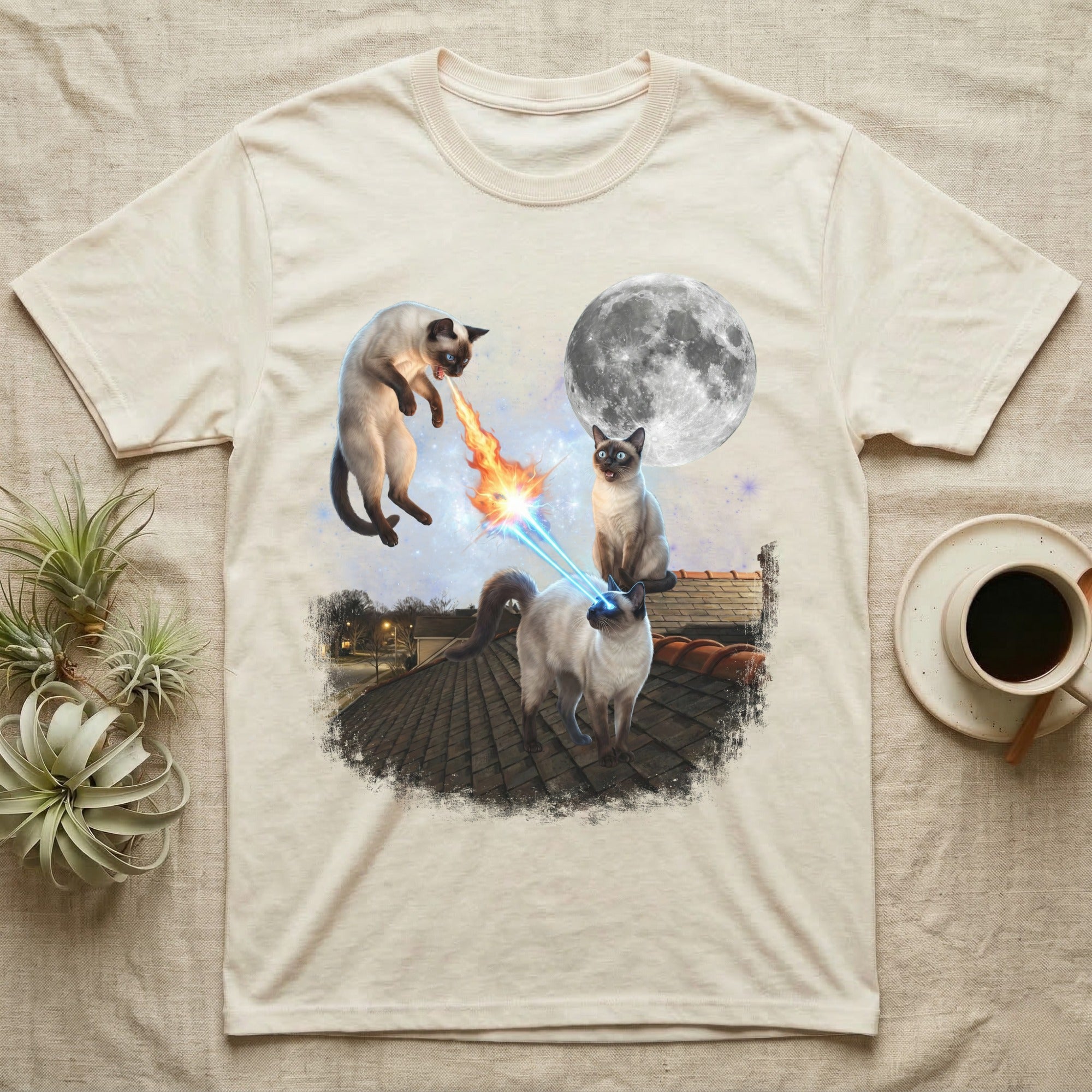 Siamese cats on a rooftop with a moon and laser beams.