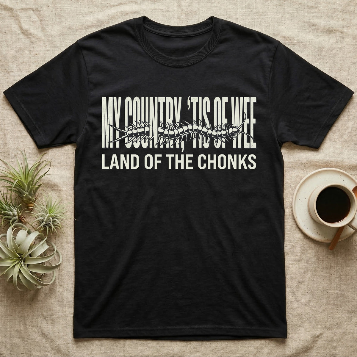 Centipede Land Of Chonks T-Shirt in Black — Black-and-white woodcut centipede across distressed text reading My Country Tis of Wee, Land of the Chonks.