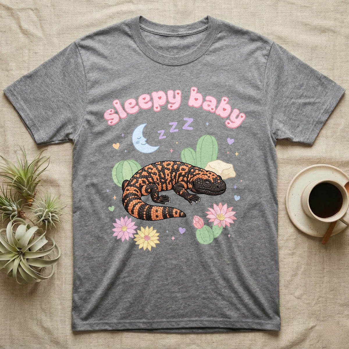 Gila Monster Baby T-Shirt in Sport Grey — Pastel Gila monster with sleepy eyes, crescent moon and Z Z Z, puffy salmon bubble wordmark "sleepy baby" above.
