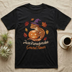 Crested Gecko Gourd Times T-Shirt in Black — Cartoon crested gecko in a witch hat on a glowing jack-o'-lantern, "Just Here for the Gourd Times."