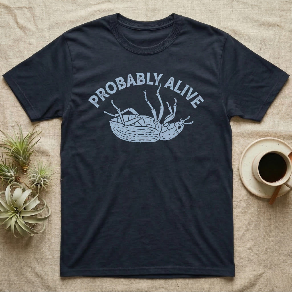 Death Feigning Beetle Probably Alive T-Shirt in Navy — Chalk blue beetle lying on its back with legs raised, beneath two arched charcoal capitals reading PROBABLY ALIVE.
