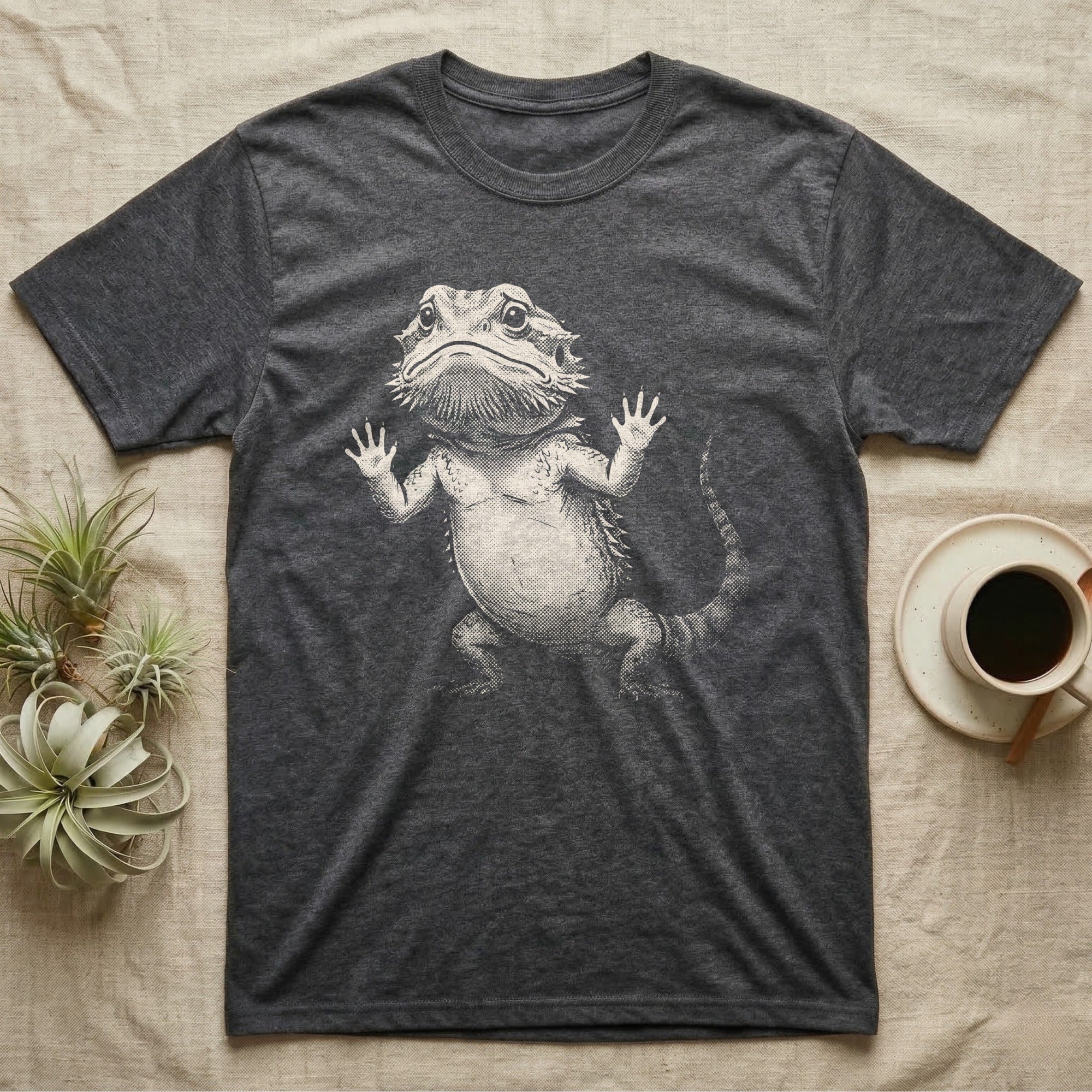 Begging Bearded Dragon T-Shirt in Dark Heather — Sad-meme halftone illustration of a bearded dragon standing upright with arms pressed to unseen glass, looking forlorn.