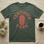 Isopod Certified Morph T-Shirt in Military Green — Carved block-print isopod seen from above inside a ring of terracotta lettering reading CERTIFIED NOT WILD TYPE.