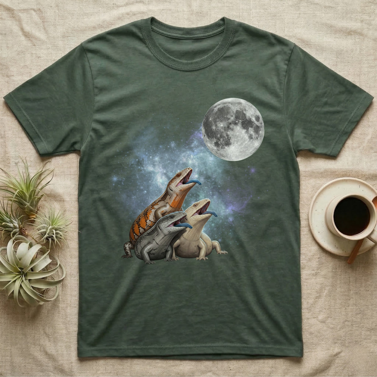 Blue-Tongued Skink Moon Howl T-Shirt in Military Green — Three Blue-Tongued Skink colour morphs howling at a full moon over a nebula on a dark grey t-shirt.