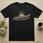 Tree Frog Freedom T-Shirt in Black — Detailed green tree frog in a tricorn hat on a ribboned branch under script Celebrating 250 Years of Freedom.