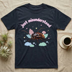 Madagascar Hissing Cockroach Baby T-Shirt in Navy — Pastel Madagascar hissing cockroach among leaves, mushroom and moss, puffy pink wordmark "just misunderstood" above.