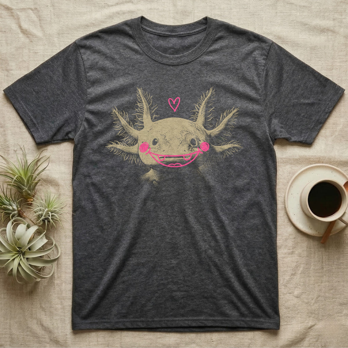 Axolotl Cute Doodle T-Shirt in Dark Heather — An axolotl's face with a pink marker grin, blush circles and a heart drawn on the glass.