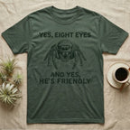 Jumping Spider Eight Eyes T-Shirt in Military Green — Engraved jumping spider head-on with large forward eyes, between stitch-look lettering on grey.