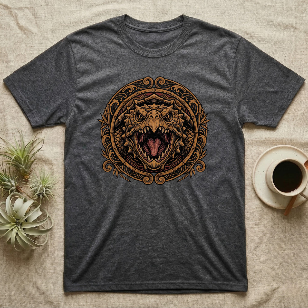 Dark gray t-shirt featuring a circular, ornate dragon head design with sharp teeth.