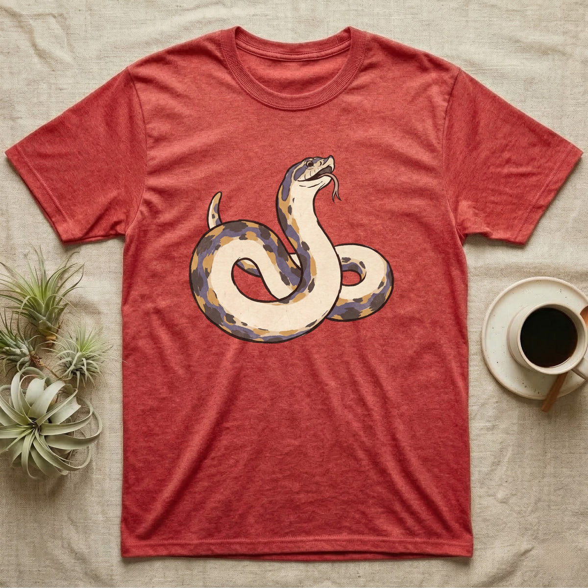 Hognose Play Dead T-Shirt in Heather Red — Ukiyo-e woodblock illustration of a western hognose snake playing dead belly-up with a deadpan serif caption beneath.