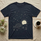 Russian Tortoise Moonlight T-Shirt in Navy — Scratchboard-style Russian tortoise walking up a steppe ridge toward a setting moon under a starry sky