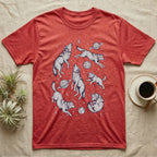 Red t-shirt with a repeating pattern of wolves in space among planets and stars.