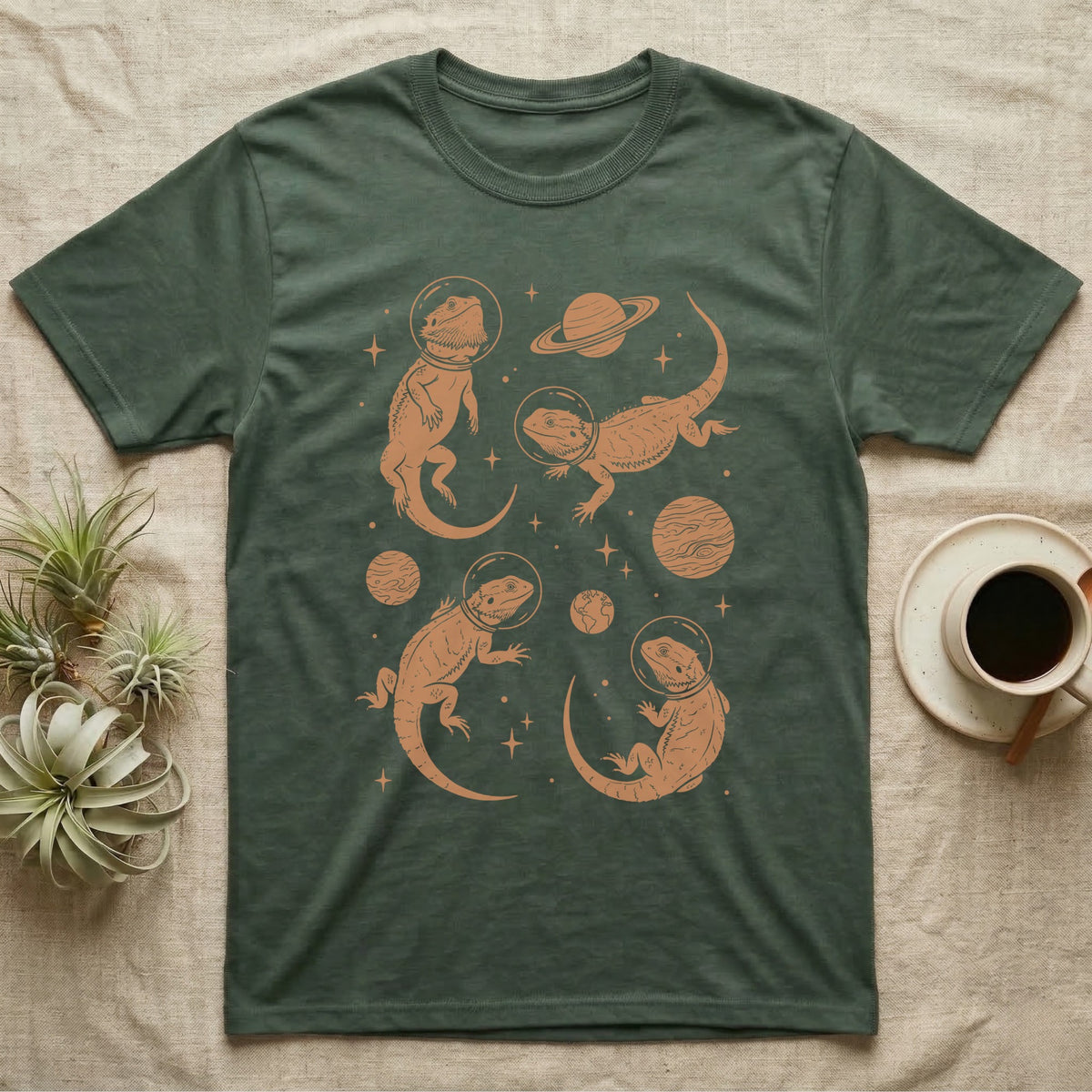 Bearded Dragon Cosmic T-Shirt in Military Green — Vintage screen-print illustration of bearded dragons in astronaut helmets floating in space, warm copper monochromatic on dark background.