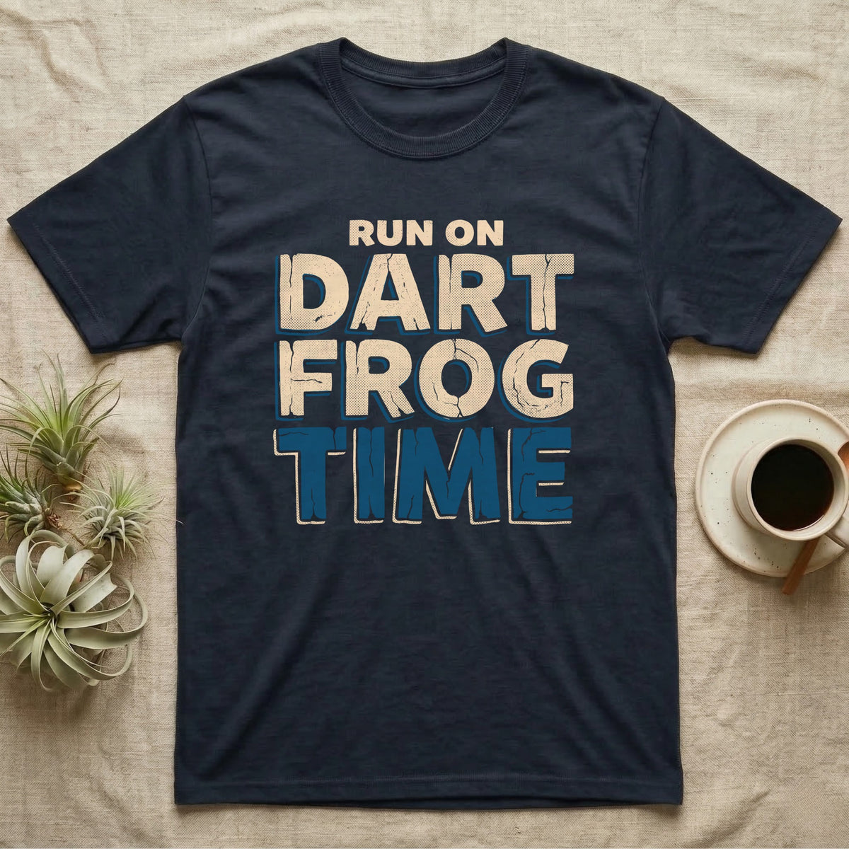 Dart Frog Time T-Shirt in Navy — Distressed-block wordmark reading run on dart frog time in a bold two-tier chest lockup, text only.
