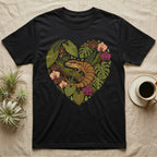 Black t-shirt with heart-shaped nature design featuring a lizard and orchids.