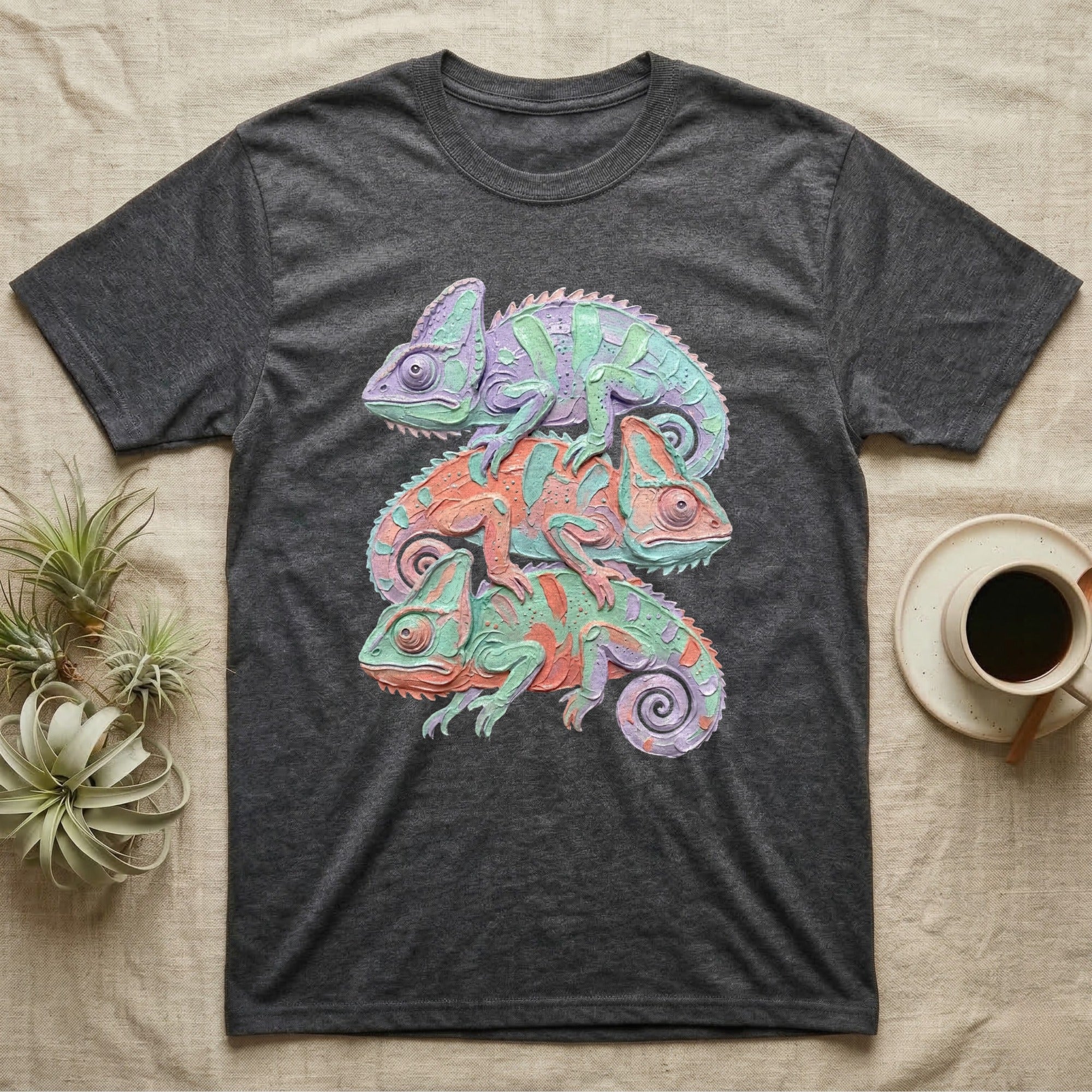 Dark gray t-shirt with three stacked chameleons in purple, orange, and green.