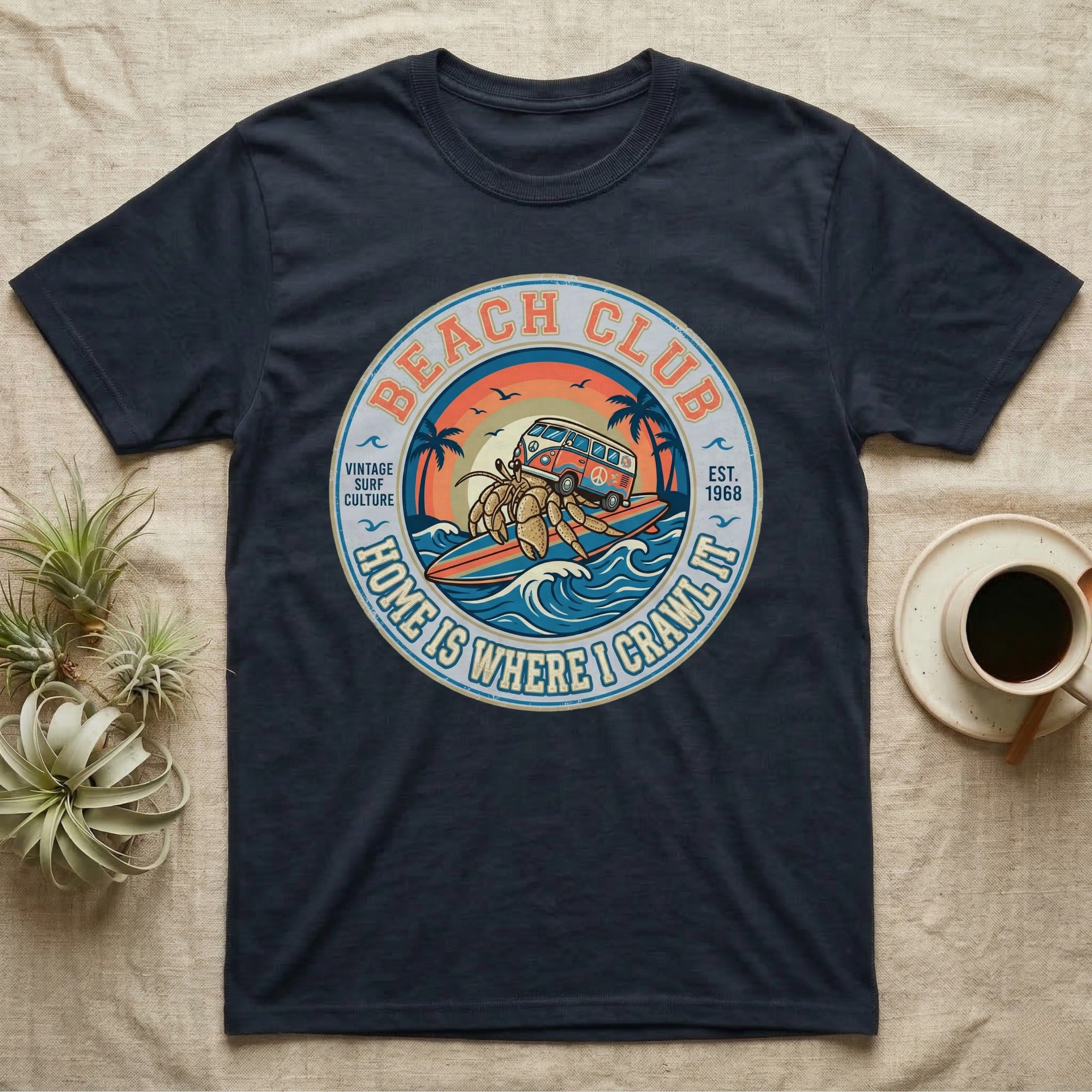 Navy t-shirt with circular vintage surf club graphic featuring a van and crabs.