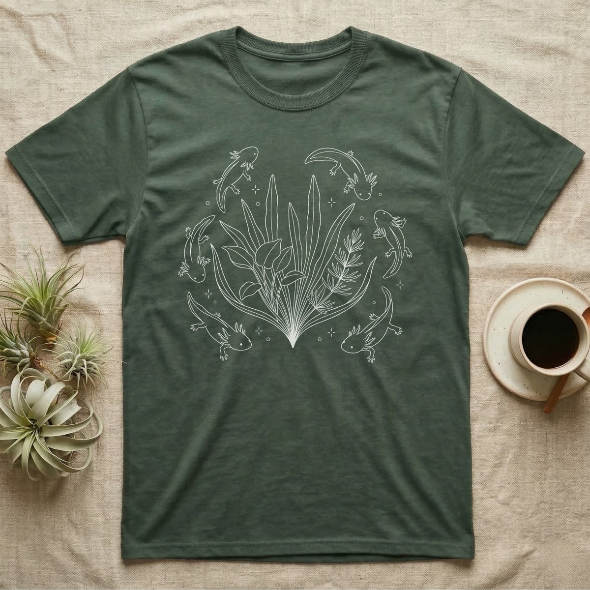 Axolotl Fine Line Botanical T-Shirt in Military Green — Fine-line white ink illustration of five axolotls drifting around a fanned spray of anubias and java fern.