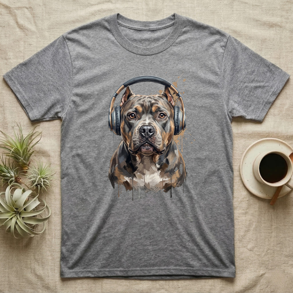 Pitbull wearing headphones, painted artwork on a grey t-shirt.