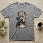 Pitbull wearing headphones, painted artwork on a grey t-shirt.