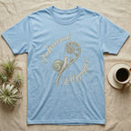 Light blue t-shirt with "Professional Lollygagger" and snail on fern graphic.