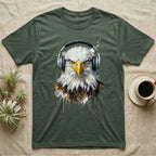 Eagle head with headphones, graphic design on a green t-shirt.