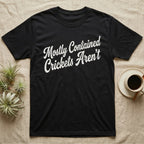 Reptile Cricket Escape T-Shirt in Black — Distressed off-white 1970s brush script reading Mostly Contained, Crickets Aren't, climbing a diagonal on charcoal grey