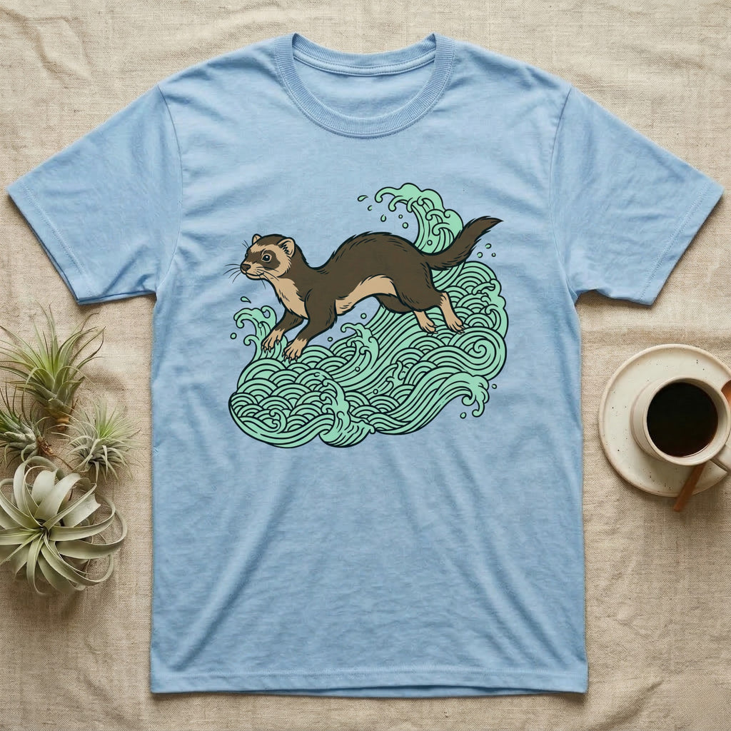 Light blue t-shirt with a brown ferret on green waves design.