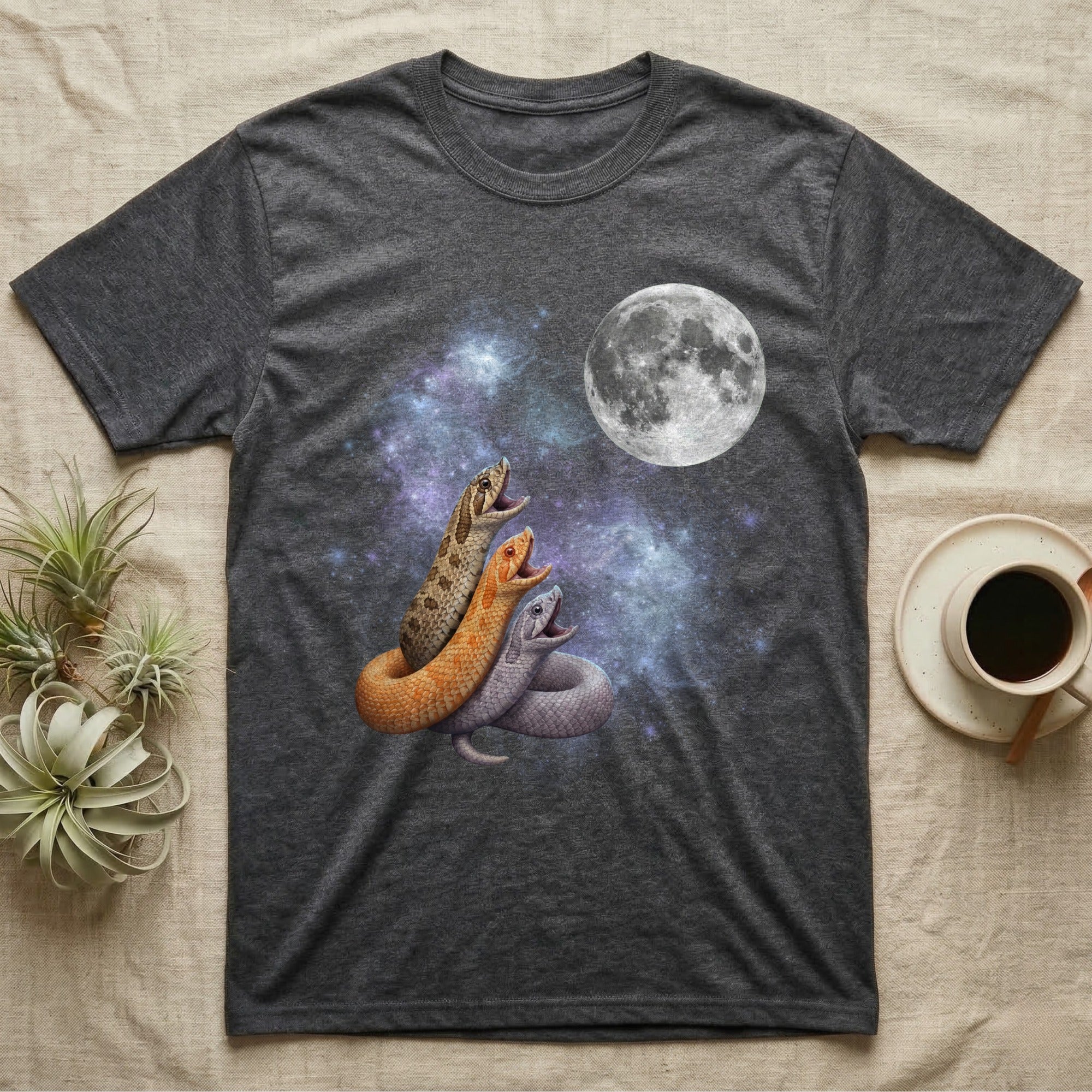 Western Hognose Snake Moon Howl T-Shirt in Dark Heather — Three Western Hognose Snake colour morphs howling at a full moon over a nebula on a dark grey t-shirt.